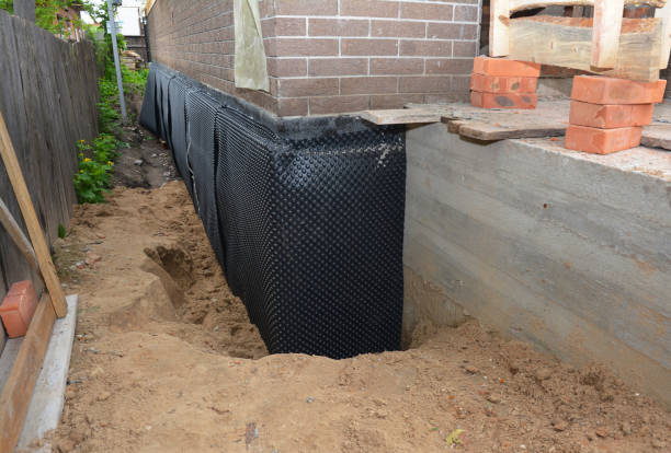Happy homeowners after waterproofing job in Buckingham